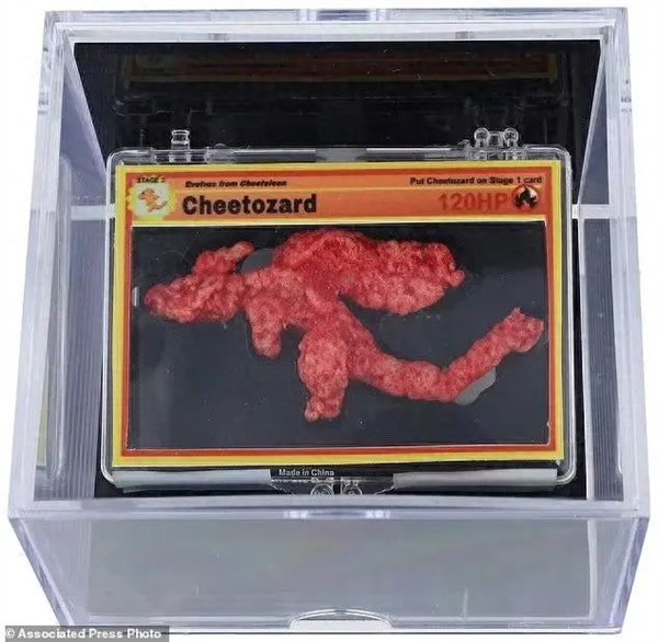 一块膨化零食卖到63万元 只因形似宝可梦喷火龙 一块膨化零食卖到63万元 只因形似宝可梦喷火龙图片